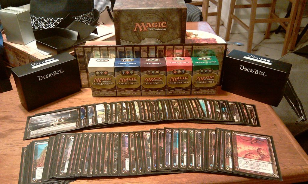 Magic: The Gathering - All 5 commander decks with their commanders, one of each Archenemy scheme, and one of each Planechase plane (including all the promotional planes). Anyone wanna play? :D - Credit: Asmor