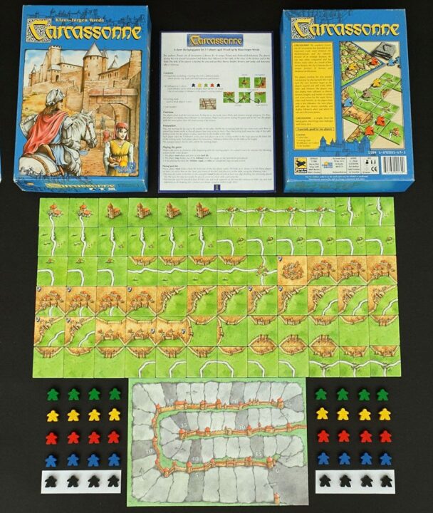 Carcassonne - Carcassonne Components. Rio Grande First Edition. The free river expansion in this edition is not shown. - Credit: FortyOne