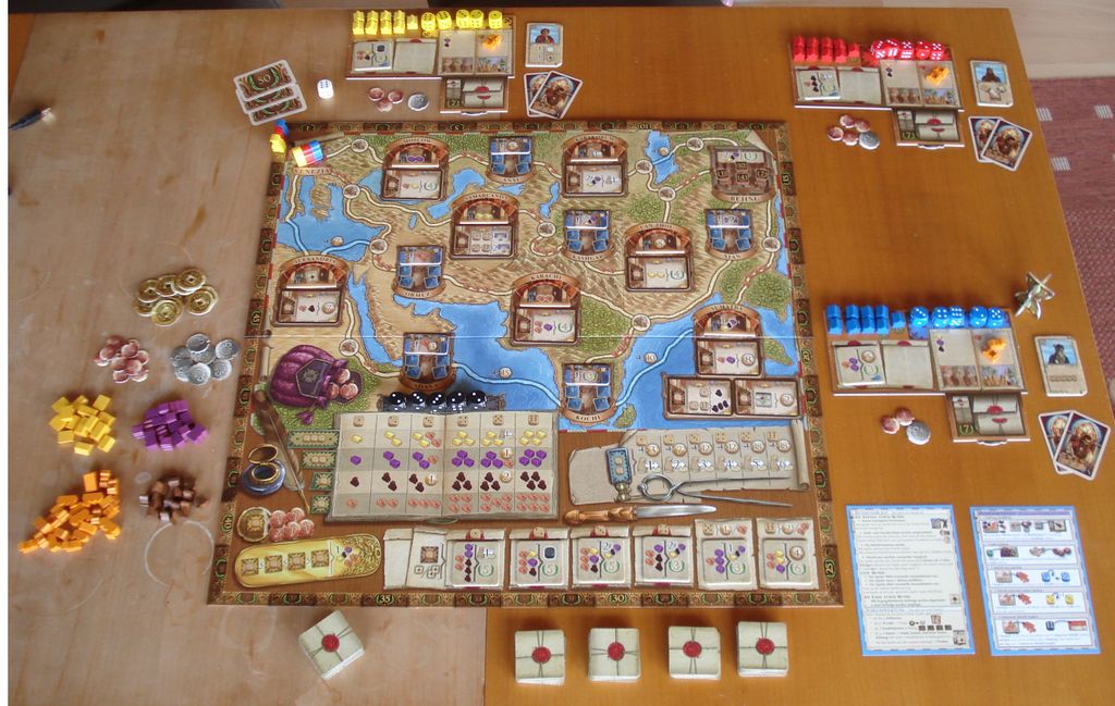 The Voyages of Marco Polo - Setup for three players, following the guidelines for a beginner's game. - Credit: MiWi