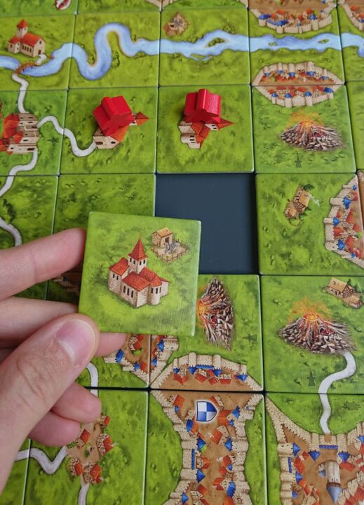 Carcassonne - It's always good to complete 2 cloisters with another cloister ;) (and of course put a meeple on it!) - Credit: Kaligula