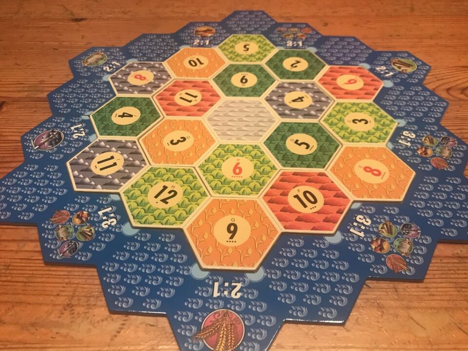 CATAN - Japanese ed. Gameboard (front) with printed number „chits“ - Credit: Reinhard Sabel