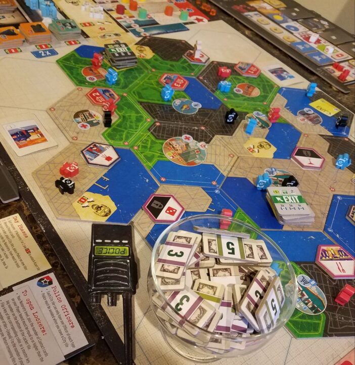 Escape Plan - Such a lovely board and the cash is some of the best board game money around! - Credit: Johnny Dangerously