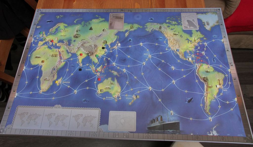 Manifest - The reverse side of the gaming board shows a Pacific-centered map. - Credit: pahvenai