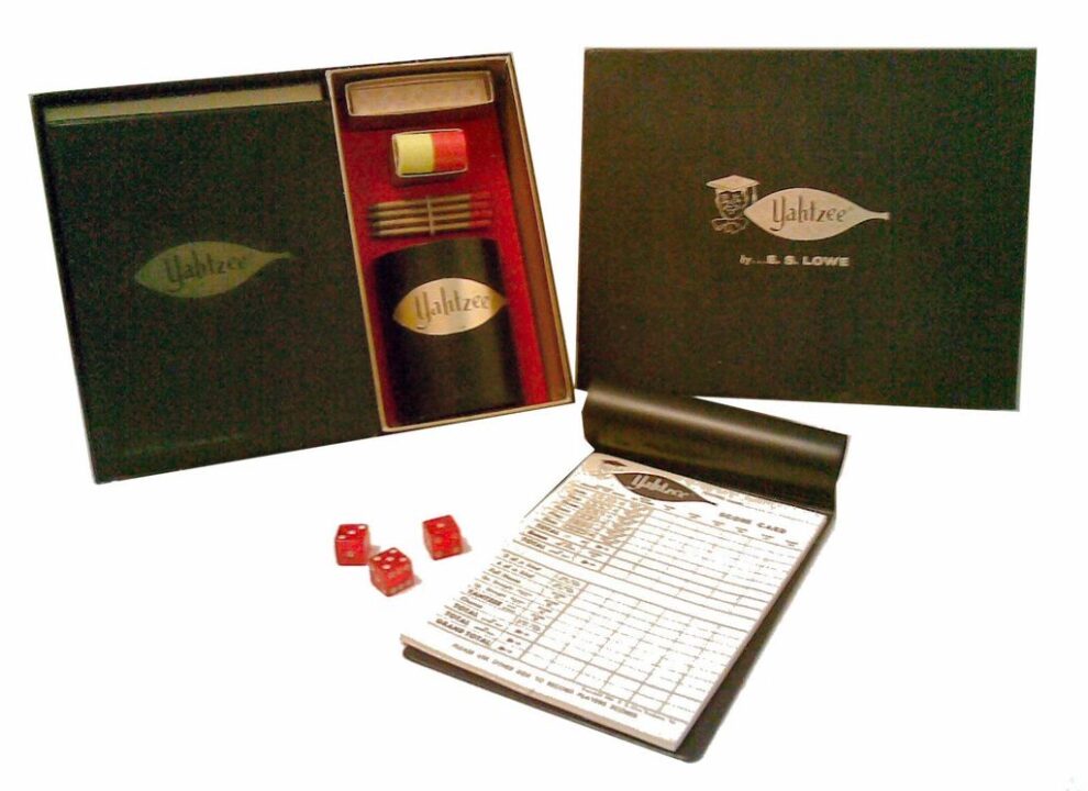 Yahtzee - 1961 Deluxe Yahtzee with leather dice cup & vinyl pad holders. Black version. - Credit: airship51