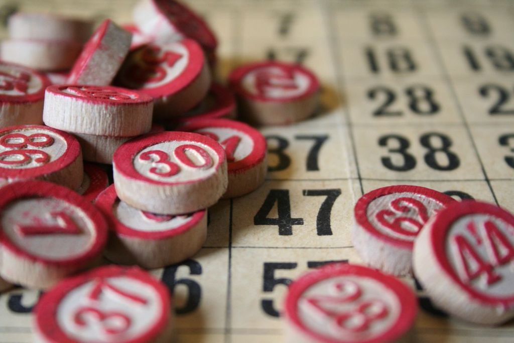 Bingo - Number chips and tracking sheet from antique Lotto game - Credit: RobertaTaylor