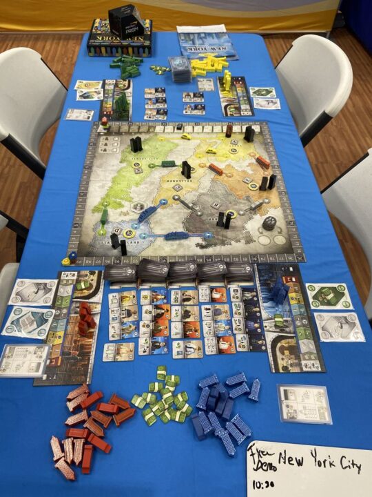 New York City - New York City, Queen Games, 2022 — production copy being played at Gen Con 2022 - Credit: W Eric Martin