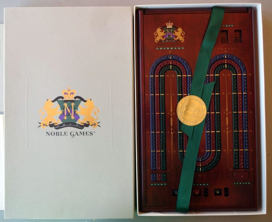 Cribbage - Noble Games box and cribbage board (measures 8.75" x 15" inches) - Credit: CurtisC