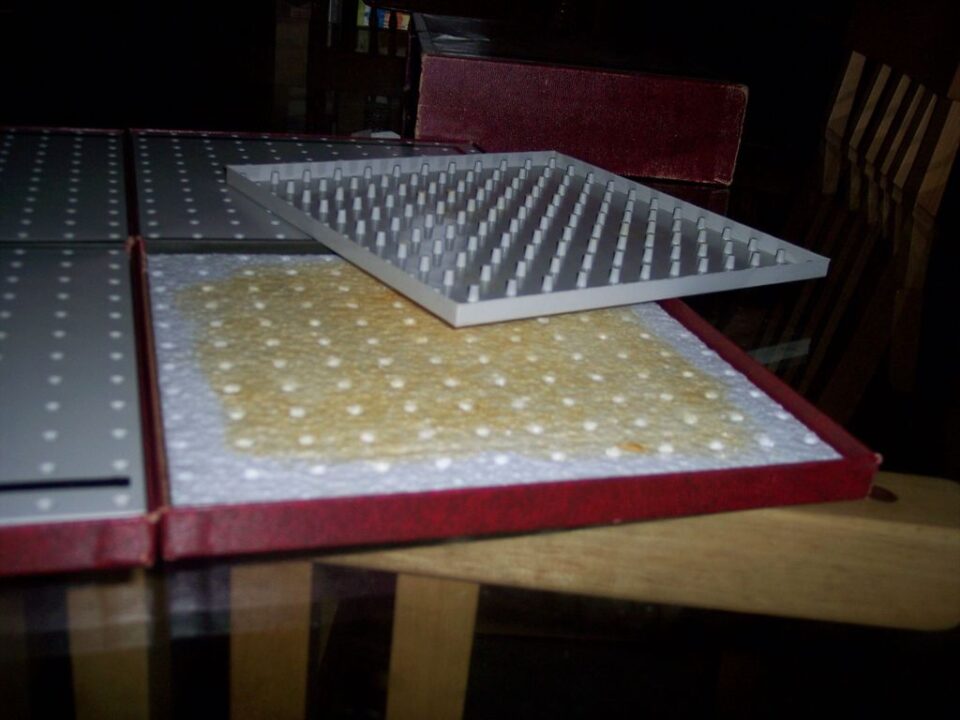 Twixt - First Edition Board is thin plastic with styrofoam padding in cardboard frame. - Credit: Blankitty
