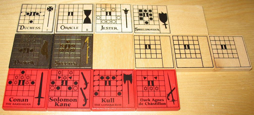 The Duke - Back of advanced tiles and Robert E. Howard tiles. Top row: Extra troop tiles and Flag. Middle row: Dragon + Specter dark tiles, Mountain, Blank tiles (1 from base game, 2 from expansion). Bottom row: Robert E. Howard tiles. - Credit: unic